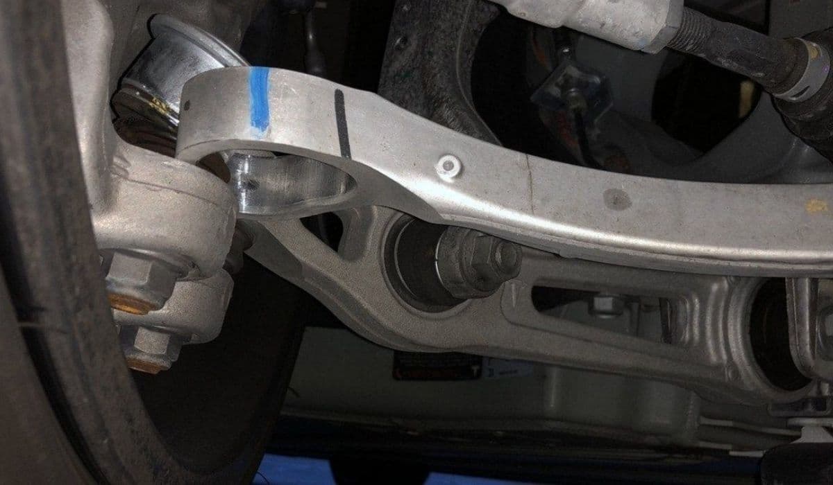 How to fix suspension knocking in Tesla Model Y (upper control arms)
